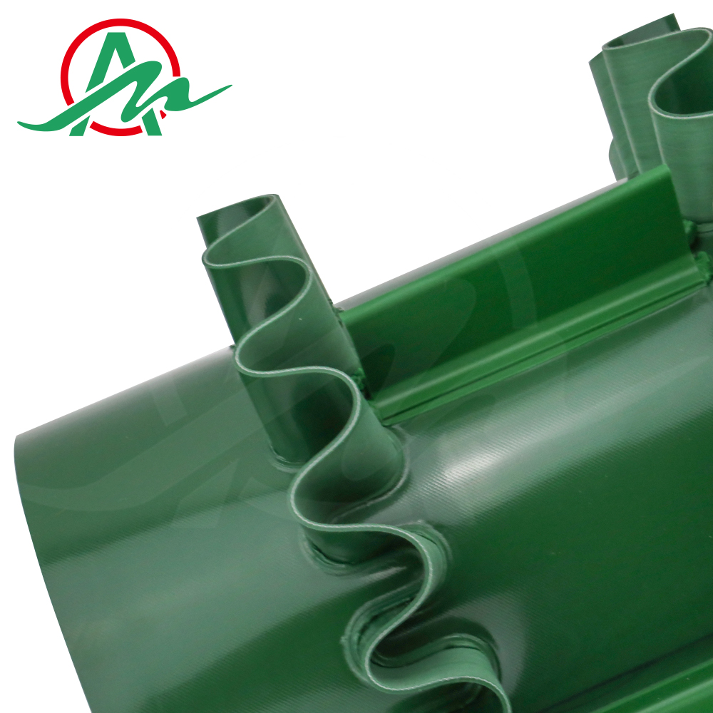 Green PVC conveyor belt with baffle and skirt sidewall